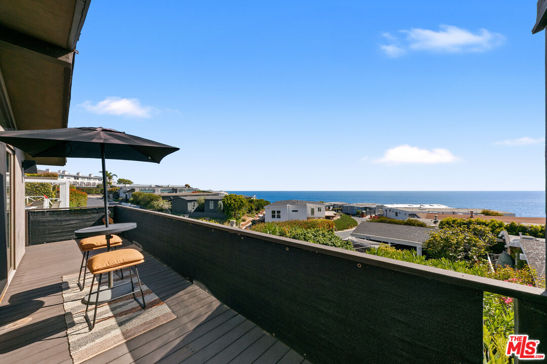 29500 Heathercliff Road, Unit 159 Malibu, CA 90265 - Photo 8 of 37 a view of roof deck with seating space