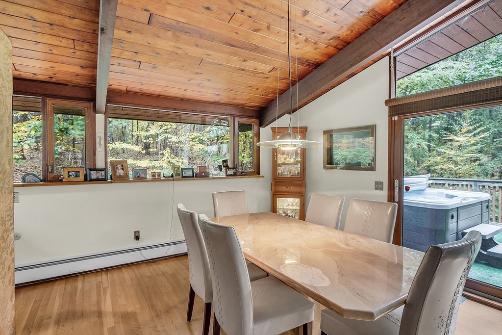 191 Heald Road Carlisle, MA 01741 - Photo 14 of 32 a view of a dining room with furniture window and outside view