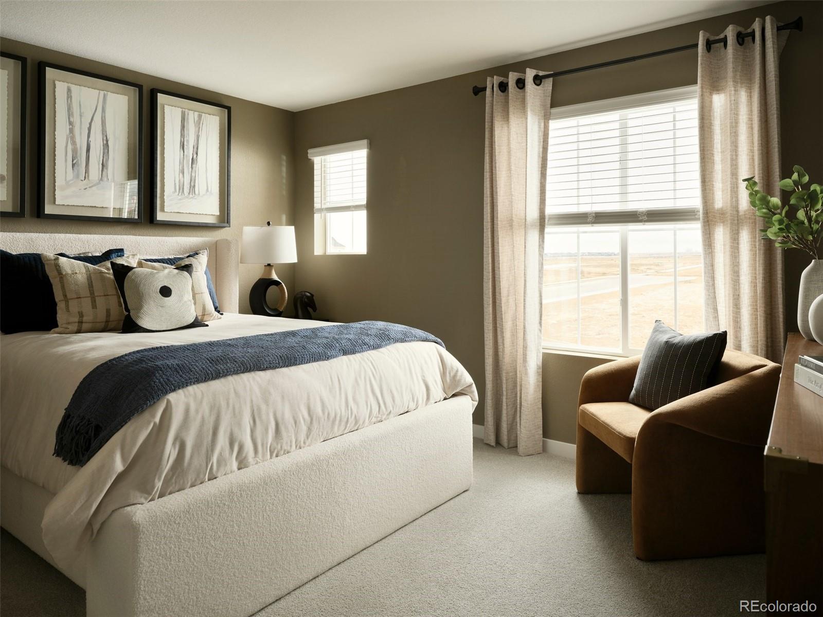13313 Ladybug Lane Firestone, CO 80504 - Photo 6 of 9 a bedroom with a bed and glass window