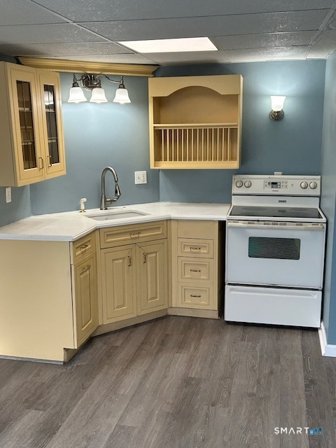 a kitchen with a stove and a sink