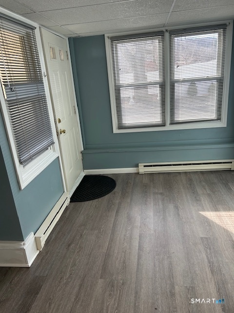 40 A High Street Winchester, CT 06098 - Photo 2 of 10 a view of front door with wooden floor and stairs