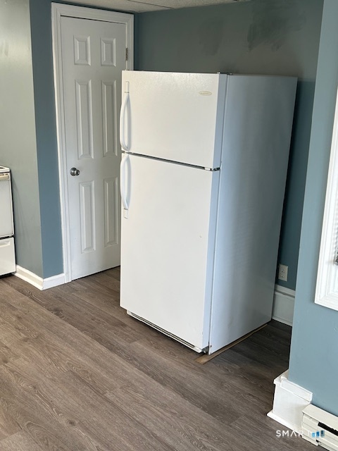 40 A High Street Winchester, CT 06098 - Photo 3 of 10 an white refrigerator freezer sitting in a kitchen