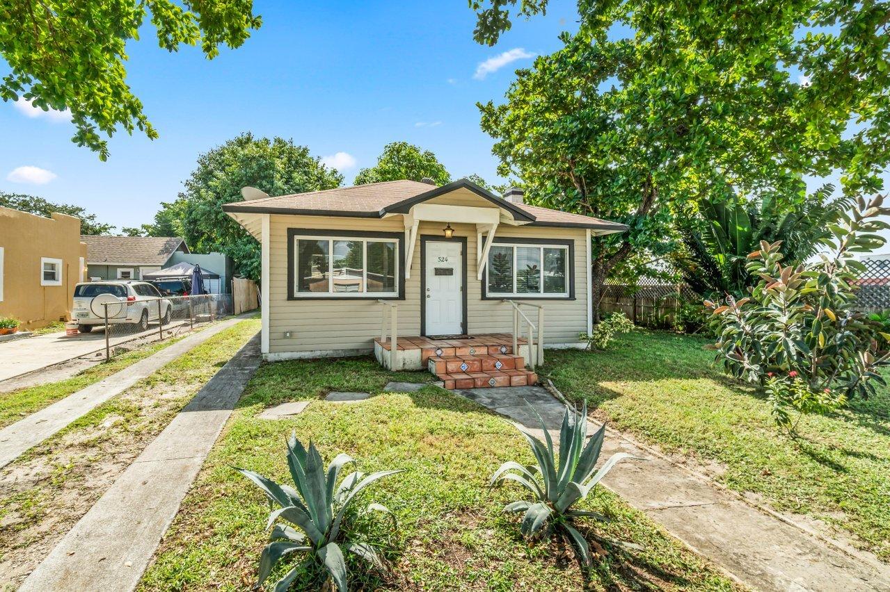 524 Colonial Road West Palm Beach, FL 33405 - Photo 2 of 29 002-524ColonialRoad-WestPalmBeach-FL-334