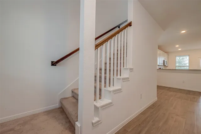 a spacious bathroom with a tub shower vanity and a sink