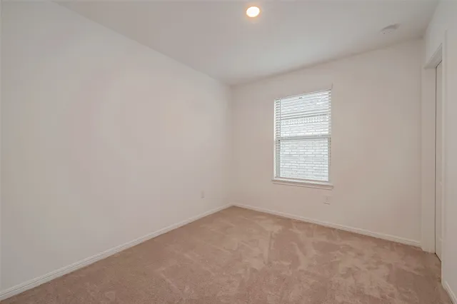 a view of a lake with a big yard