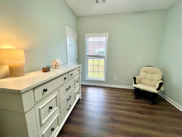 a room with natural light and a window