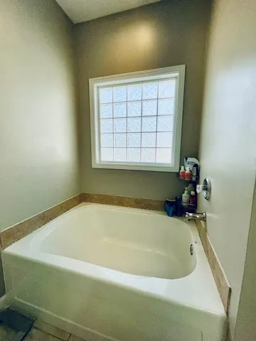 a bathroom with a bathtub