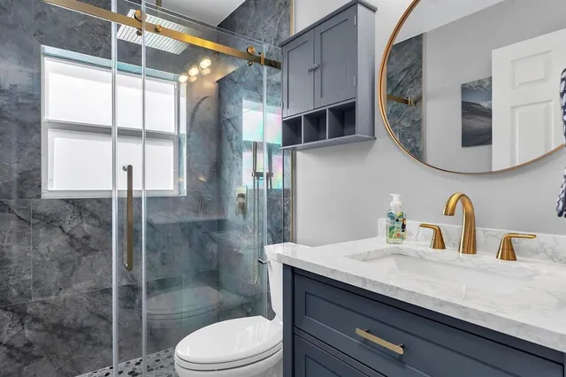 a living room with furniture a rug and a window