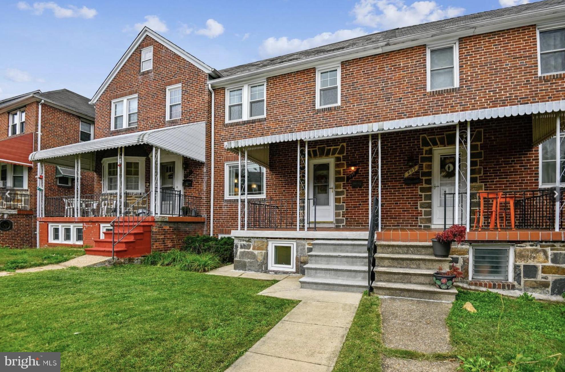 411 Overbrook Road Catonsville, MD 21228 - Photo 1 of 19 a front view of a house with garden