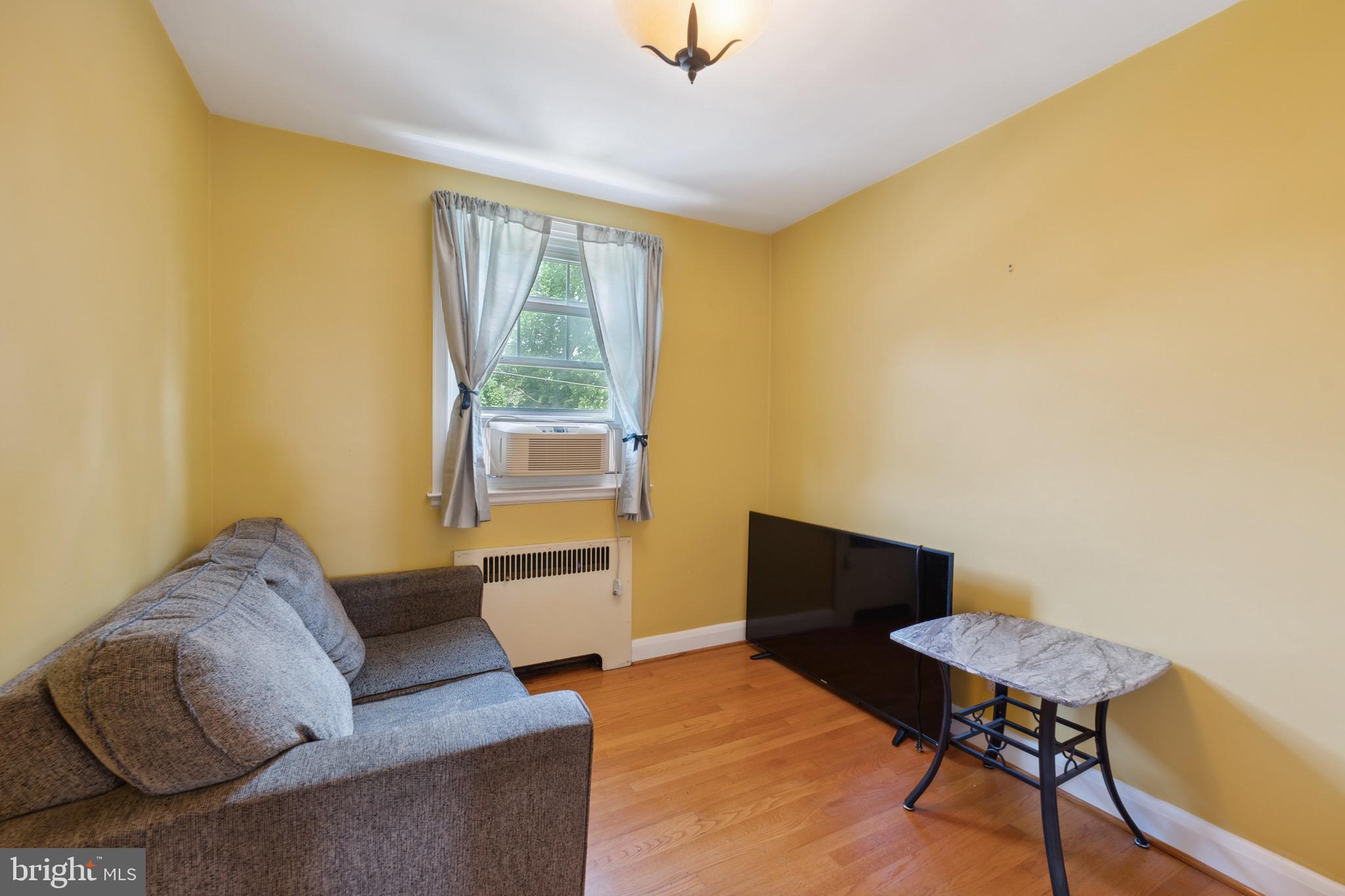 411 Overbrook Road Catonsville, MD 21228 - Photo 12 of 19 a living room with furniture and a window