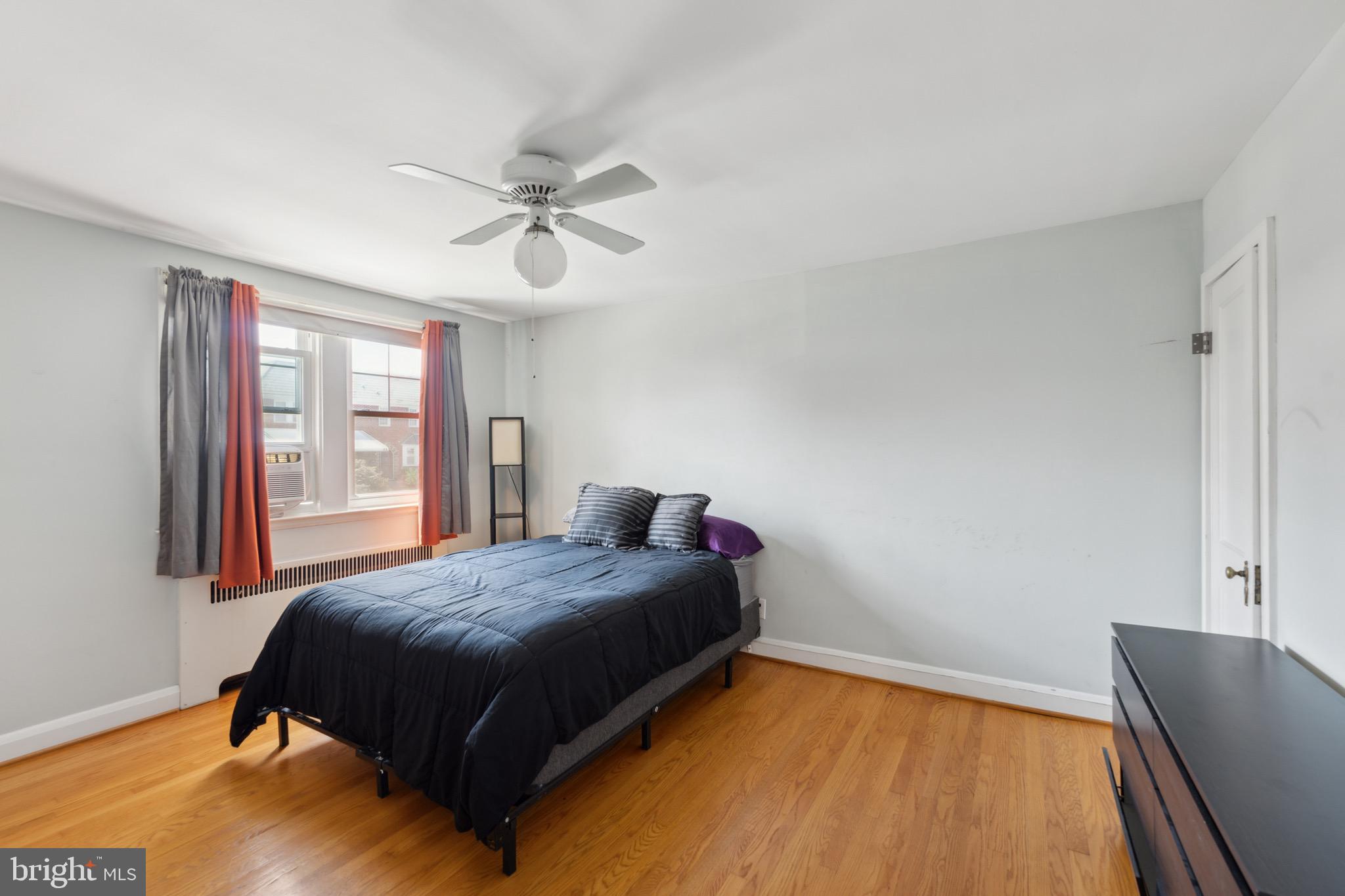 411 Overbrook Road Catonsville, MD 21228 - Photo 8 of 19 a bedroom with a bed and window