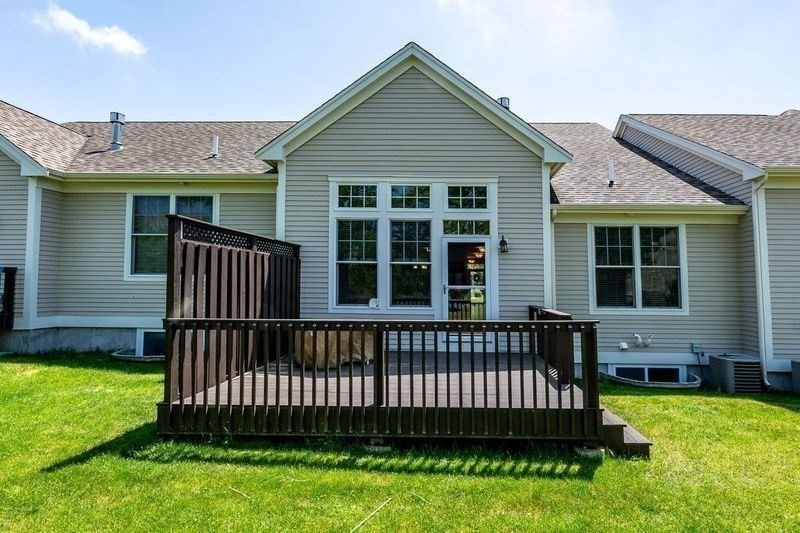 45 Grey Hawk Drive, Unit 45 Mashpee, MA 02649 - Photo 17 of 21 a view of a house with a yard and deck
