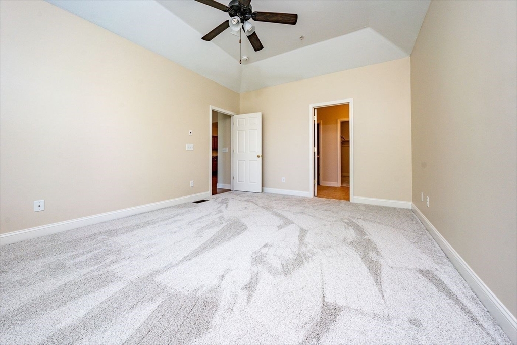 45 Grey Hawk Drive, Unit 45 Mashpee, MA 02649 - Photo 9 of 21 a view of a room with a ceiling fan