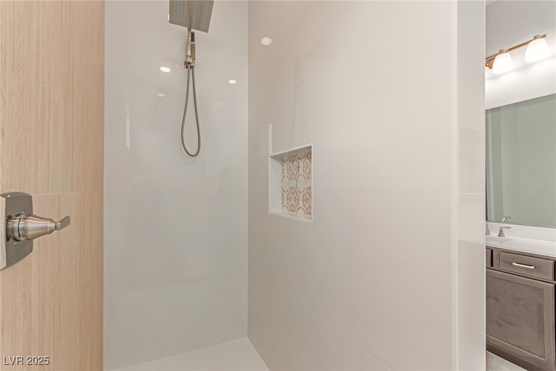 298 Nine Mile Creek Drive Las Vegas, NV 89138 - Photo 15 of 30 Bathroom with vanity and a shower
