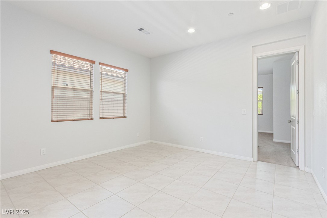 298 Nine Mile Creek Drive Las Vegas, NV 89138 - Photo 18 of 30 Unfurnished room with light tile patterned flooring and recessed lighting