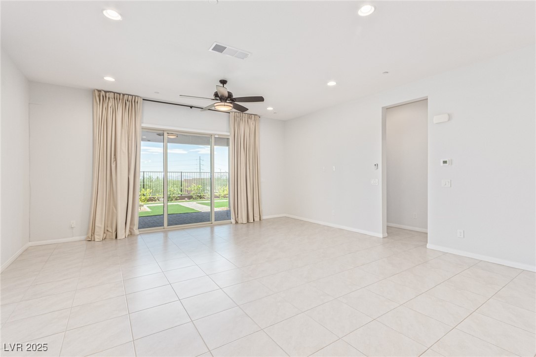 298 Nine Mile Creek Drive Las Vegas, NV 89138 - Photo 4 of 30 Unfurnished room featuring light tile patterned flooring, recessed lighting, and ceiling fan