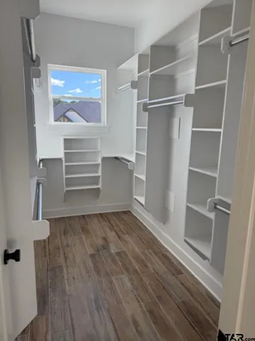 a view of an empty walk in closet