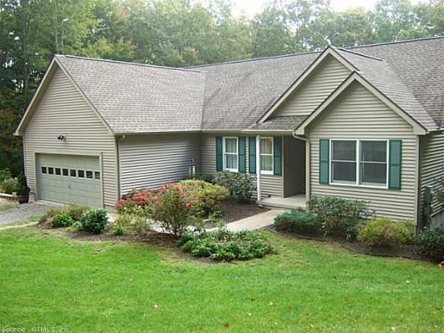 150 Scott Hill Road Lebanon, CT 06249 - Photo 1 of 1 a view of a house with a yard plants and large tree
