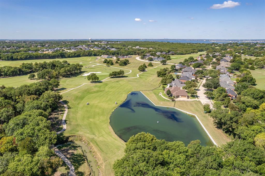8 Center Court Heath, TX 75032 - Photo 2 of 34 a view of a lake with a mountain