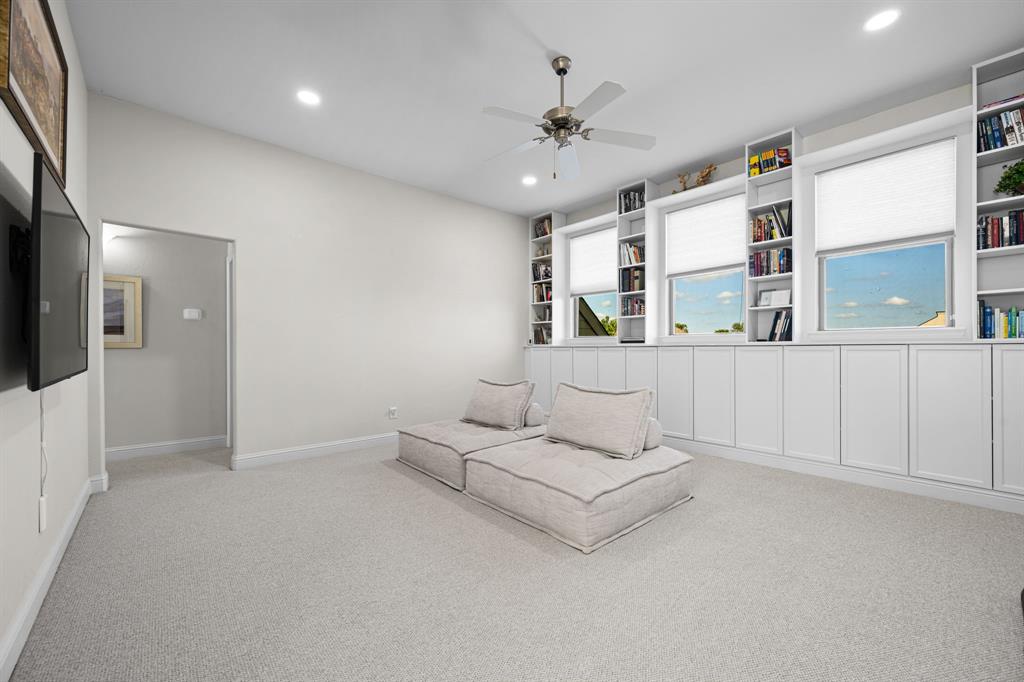 8 Center Court Heath, TX 75032 - Photo 22 of 34 a living room with furniture and white walls