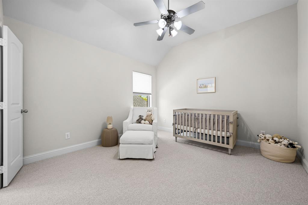 8 Center Court Heath, TX 75032 - Photo 29 of 34 a bedroom with furniture and a window