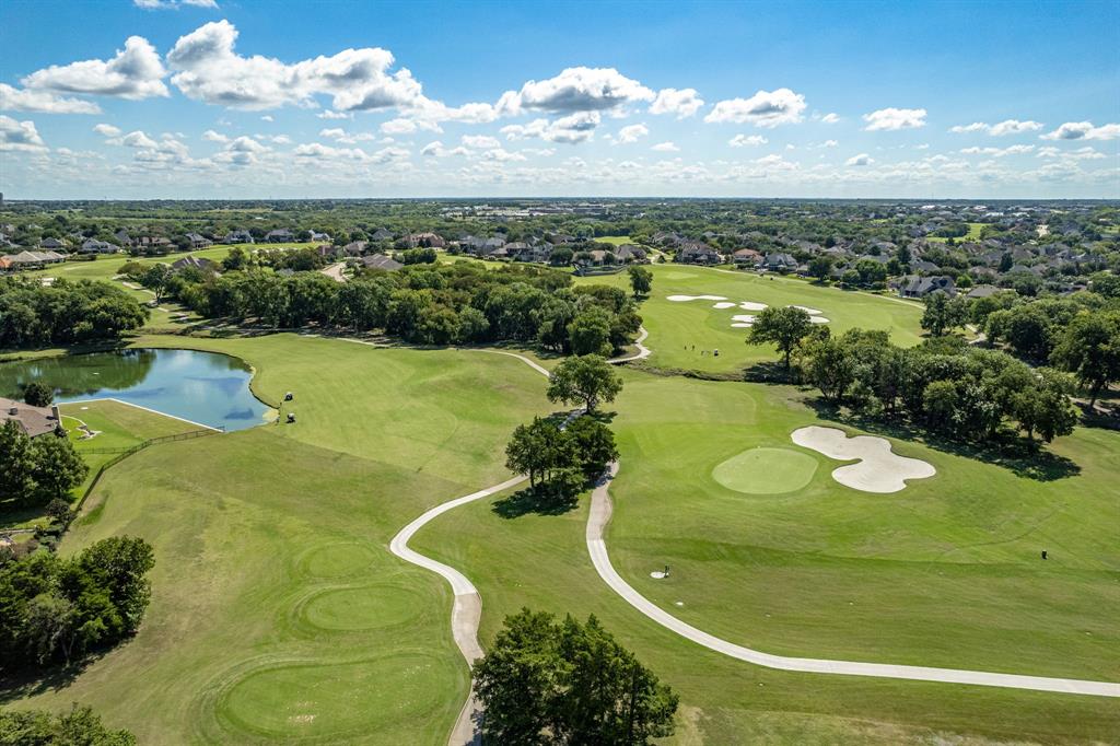 8 Center Court Heath, TX 75032 - Photo 3 of 34 a view of a lake