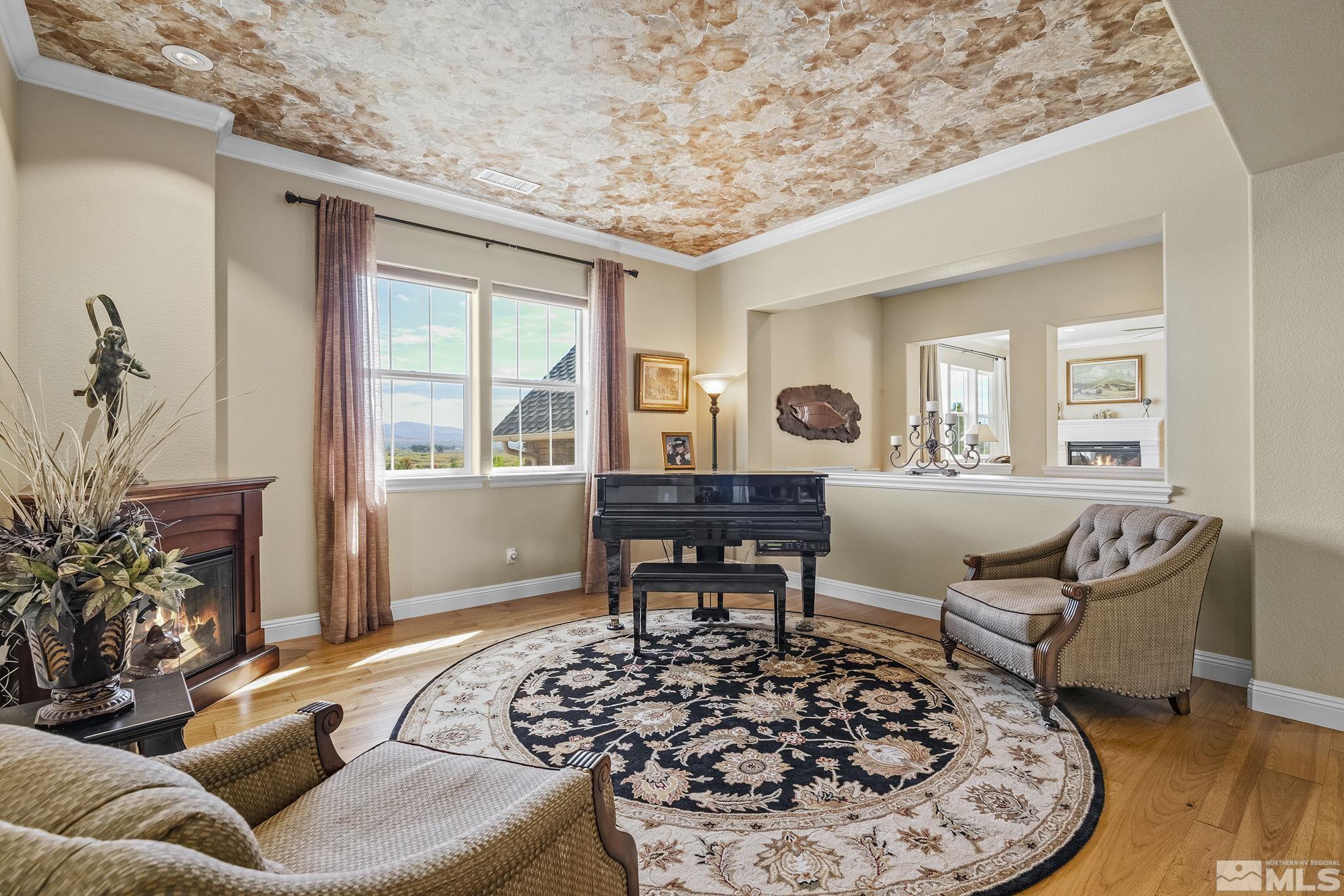 2892 Promontory Drive Genoa, NV 89411 - Photo 19 of 40 a living room with furniture and a large window