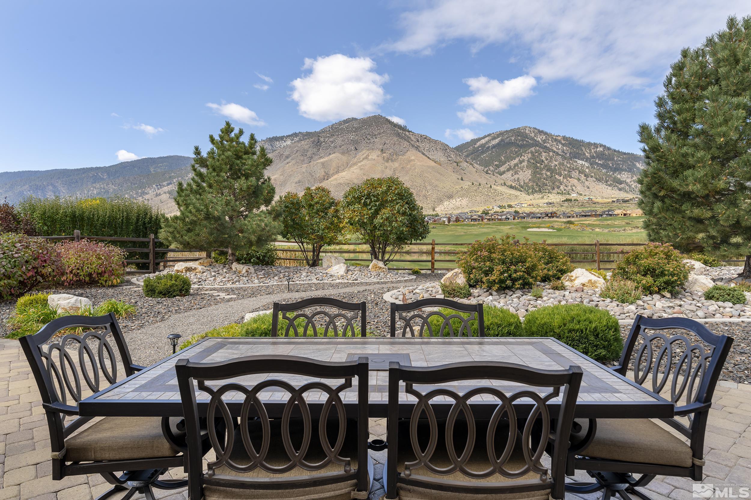 2892 Promontory Drive Genoa, NV 89411 - Photo 33 of 40 a view of a chairs and table in patio