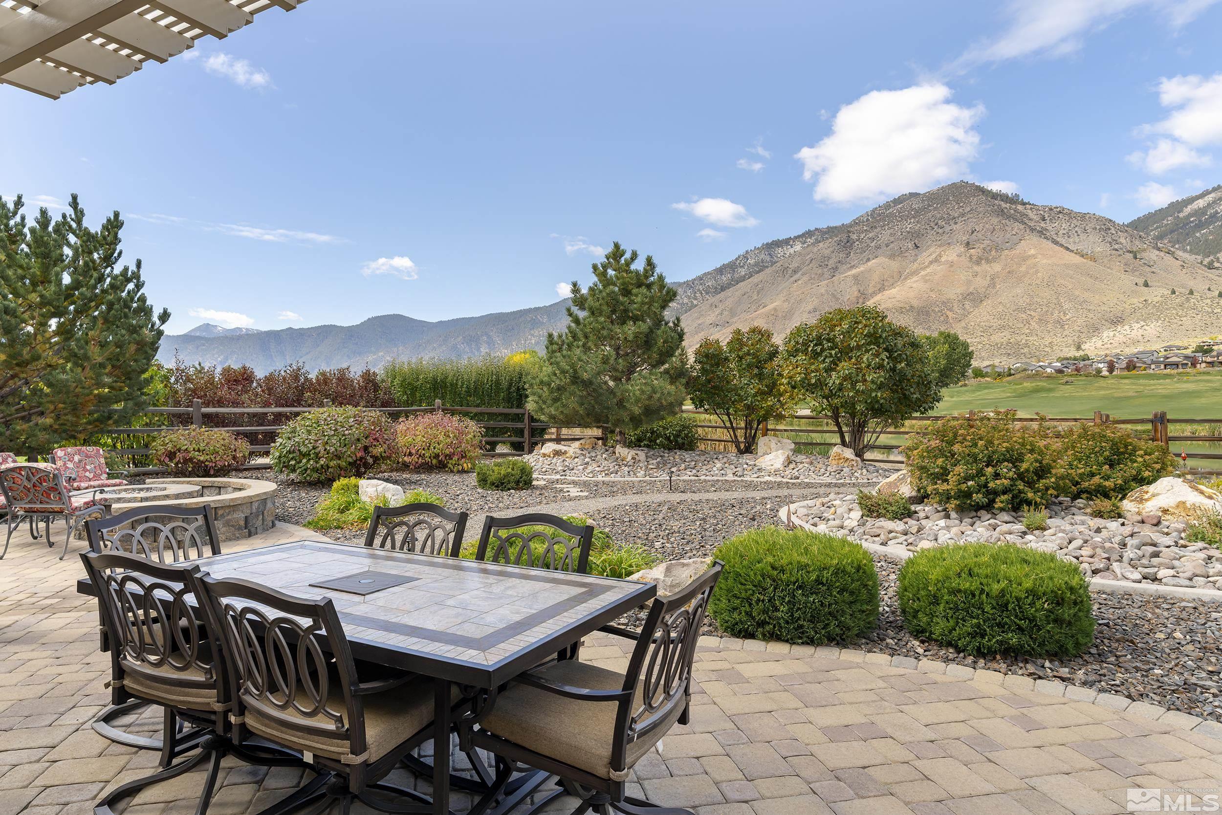 2892 Promontory Drive Genoa, NV 89411 - Photo 34 of 40 a view of a chairs and table in patio