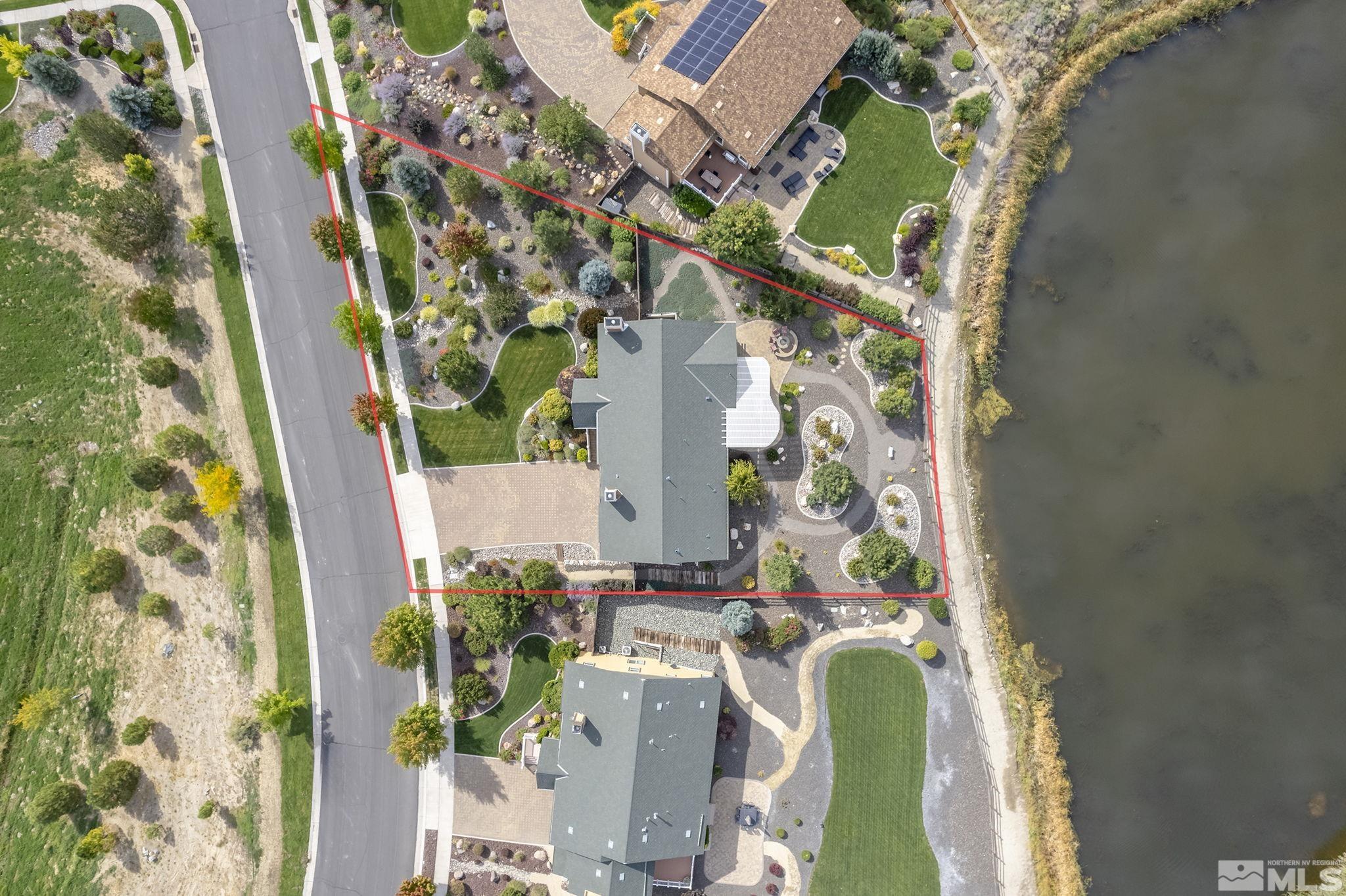 2892 Promontory Drive Genoa, NV 89411 - Photo 38 of 40 an aerial view of a house with a yard