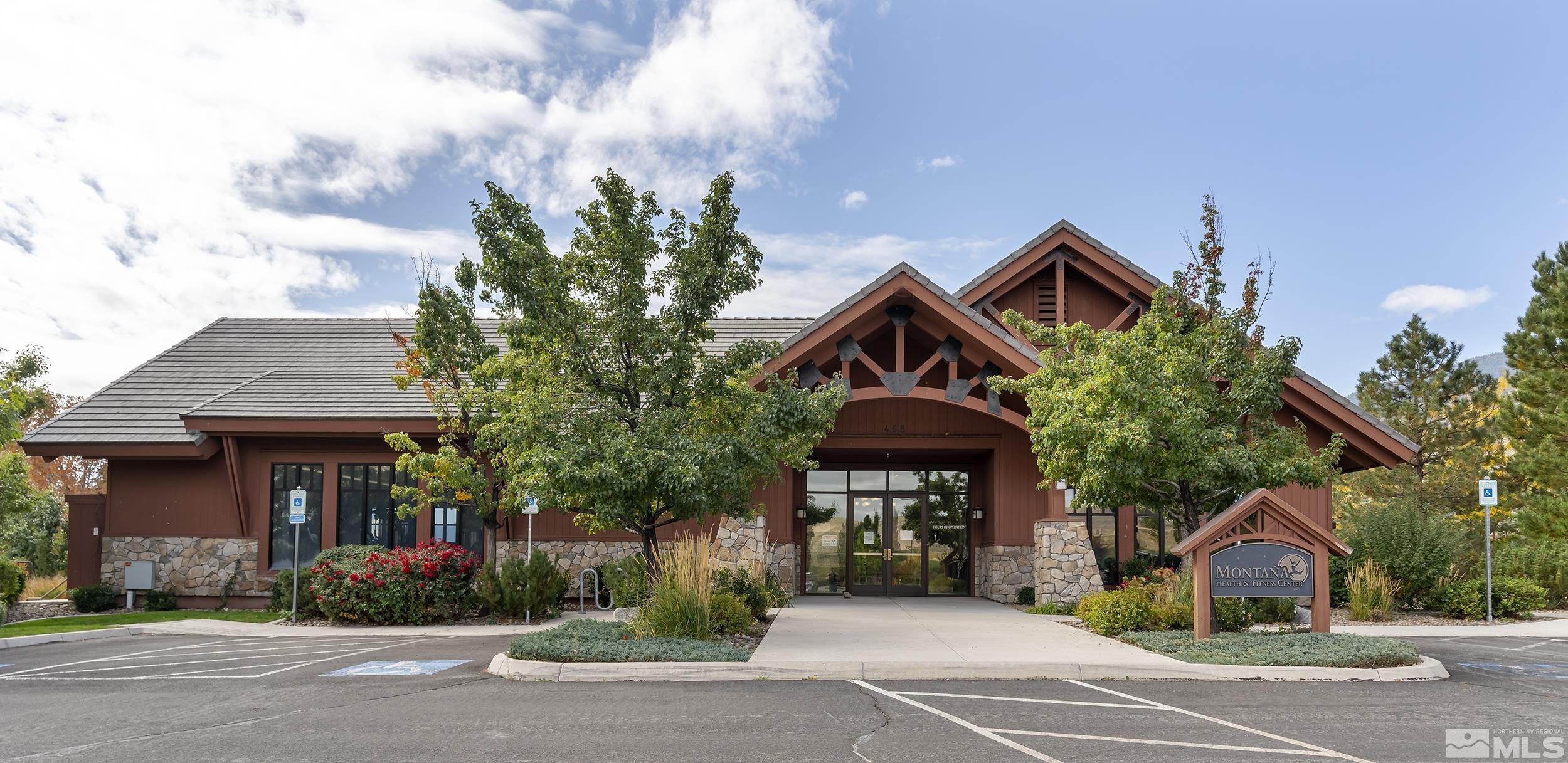 2892 Promontory Drive Genoa, NV 89411 - Photo 39 of 40 a front view of a house with a yard and garage