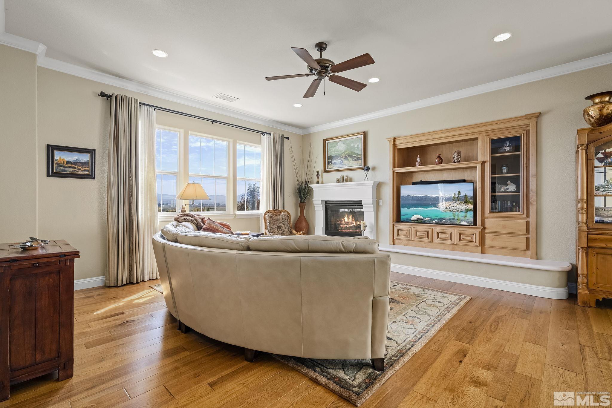 2892 Promontory Drive Genoa, NV 89411 - Photo 6 of 40 a living room with furniture and a large window