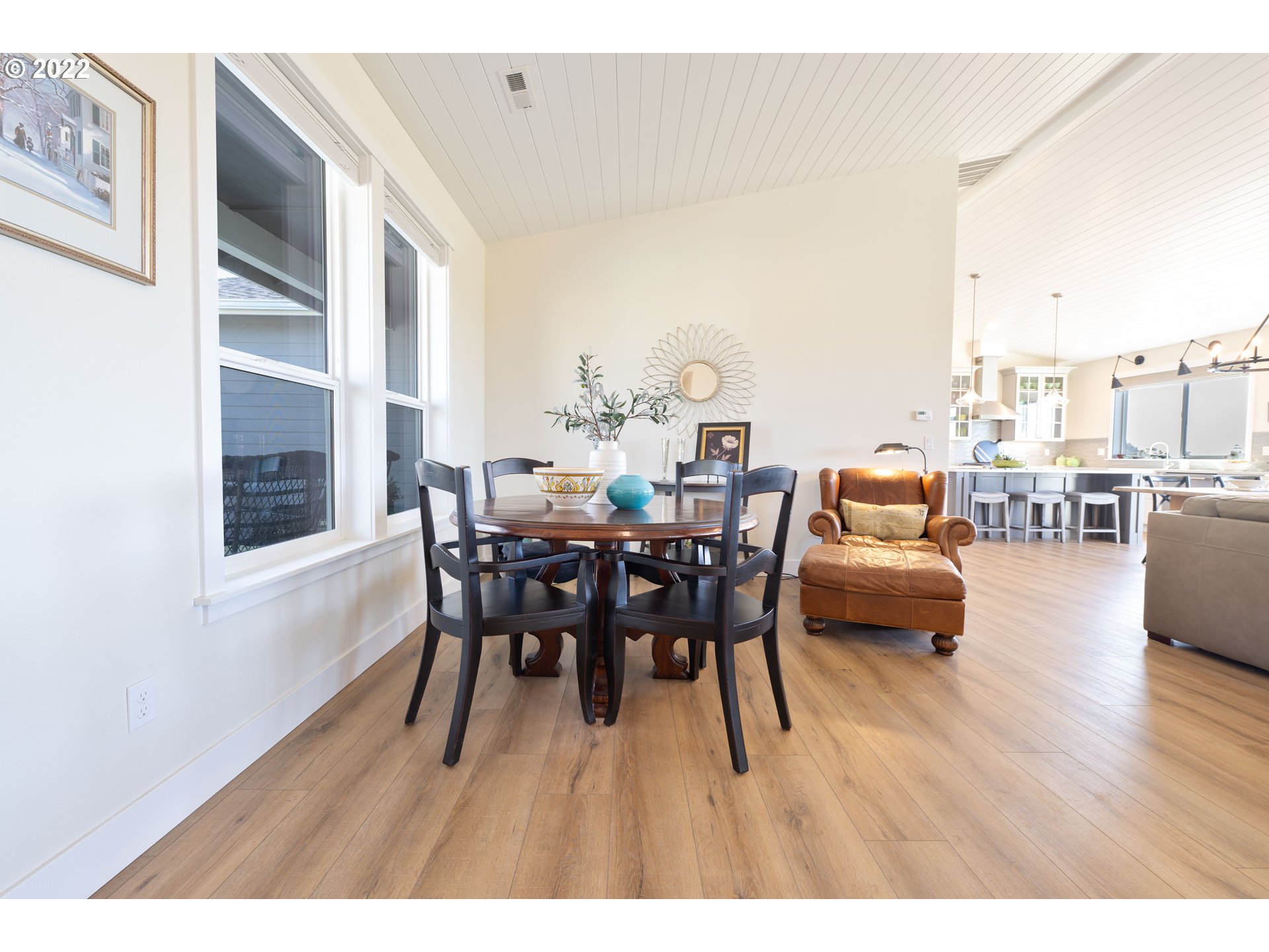 89442 Ocean Drive Warrenton, OR 97146 - Photo 11 of 31 a dining room with furniture and wooden floor