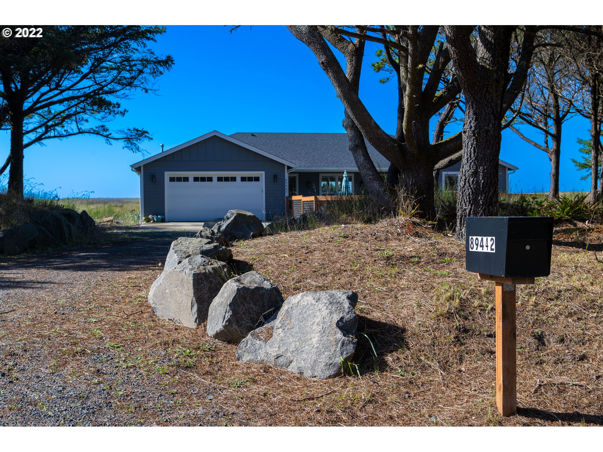 89442 Ocean Drive Warrenton, OR 97146 - Photo 16 of 31 a house view with a outdoor space