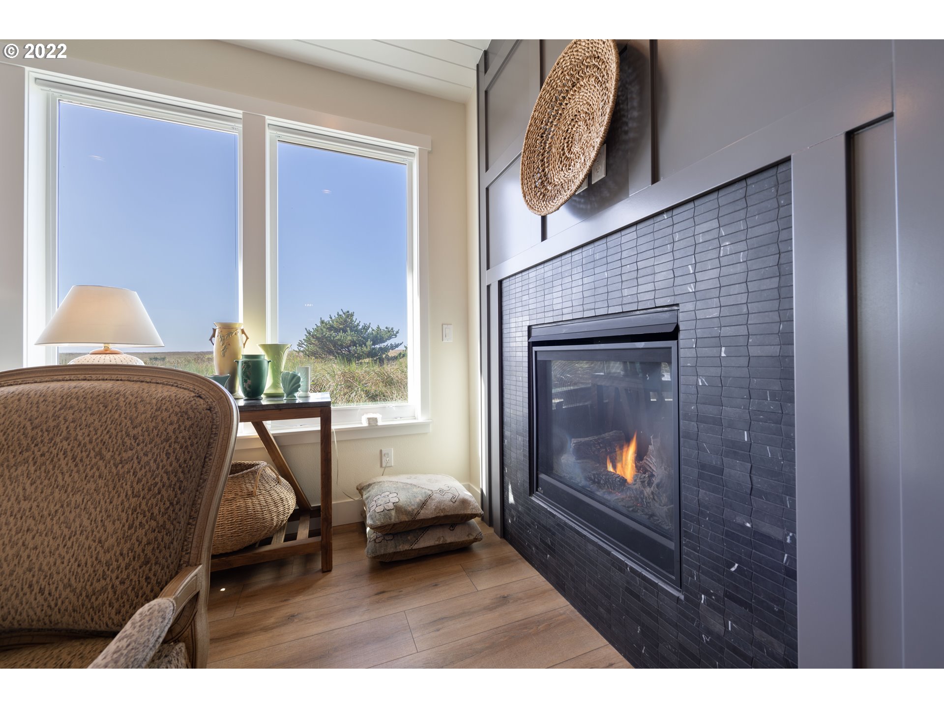 89442 Ocean Drive Warrenton, OR 97146 - Photo 21 of 31 a living room with furniture and a fireplace
