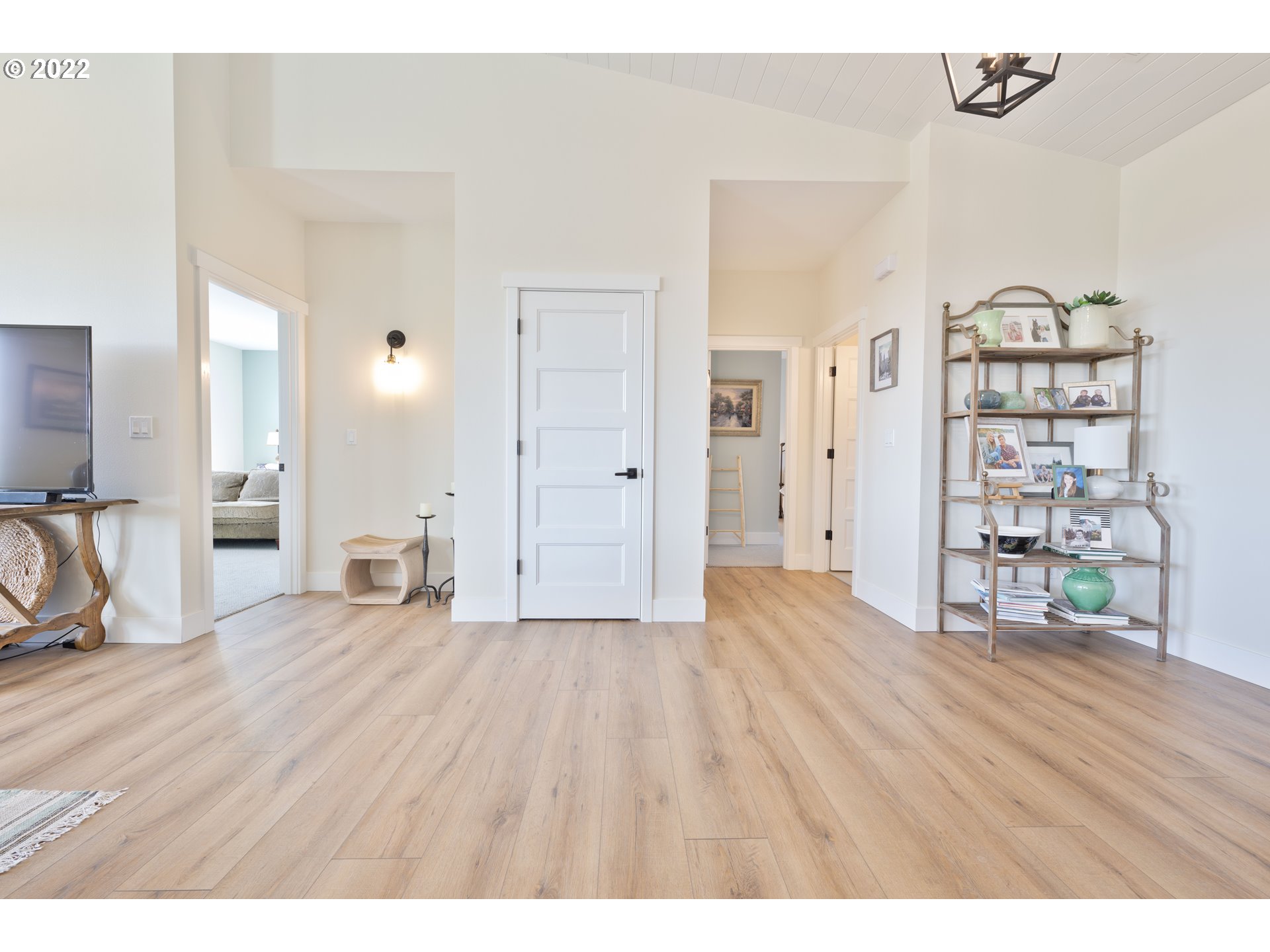 89442 Ocean Drive Warrenton, OR 97146 - Photo 22 of 31 wooden floor and windows in a room