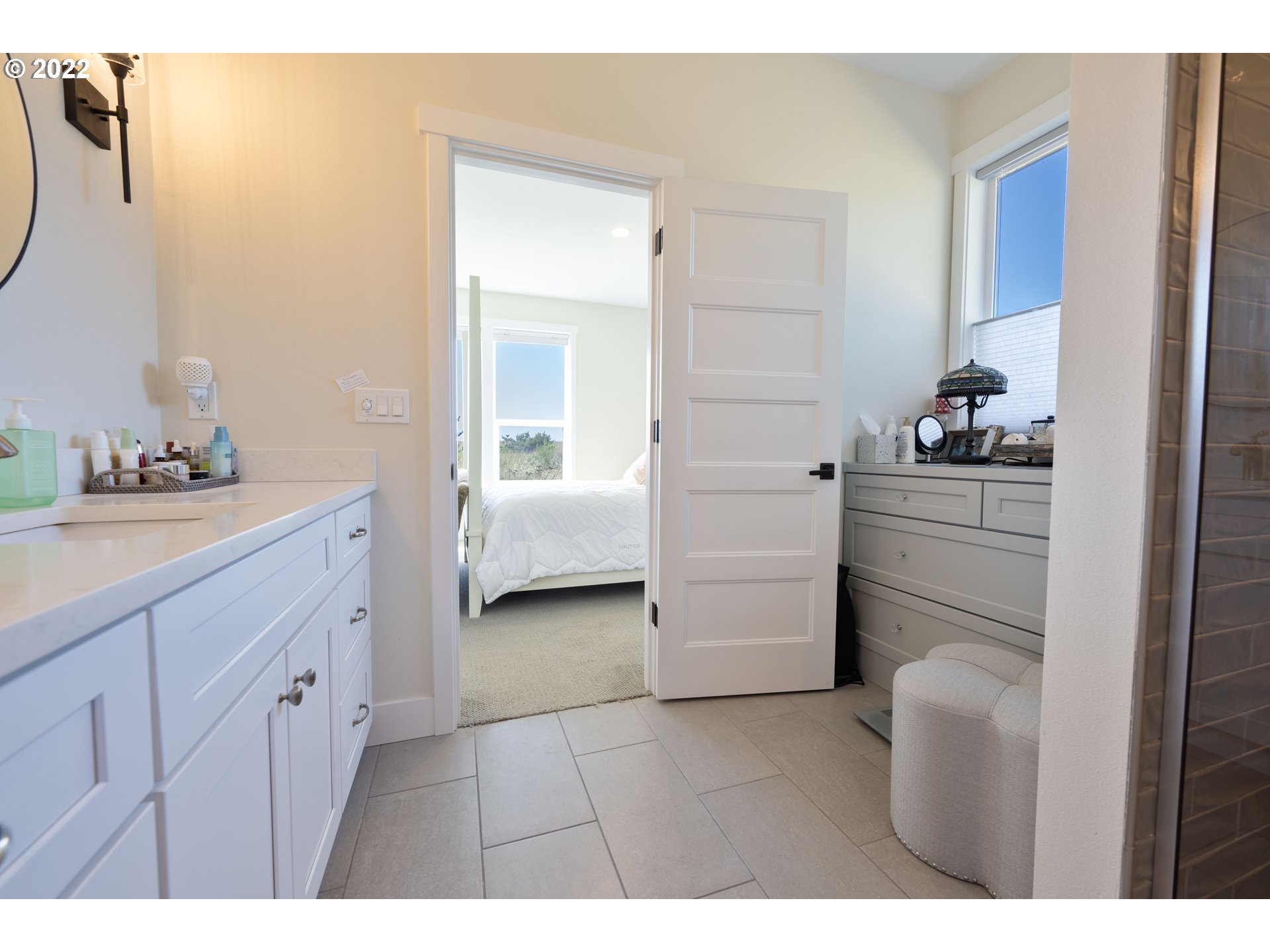 89442 Ocean Drive Warrenton, OR 97146 - Photo 7 of 31 a kitchen with a refrigerator and a sink