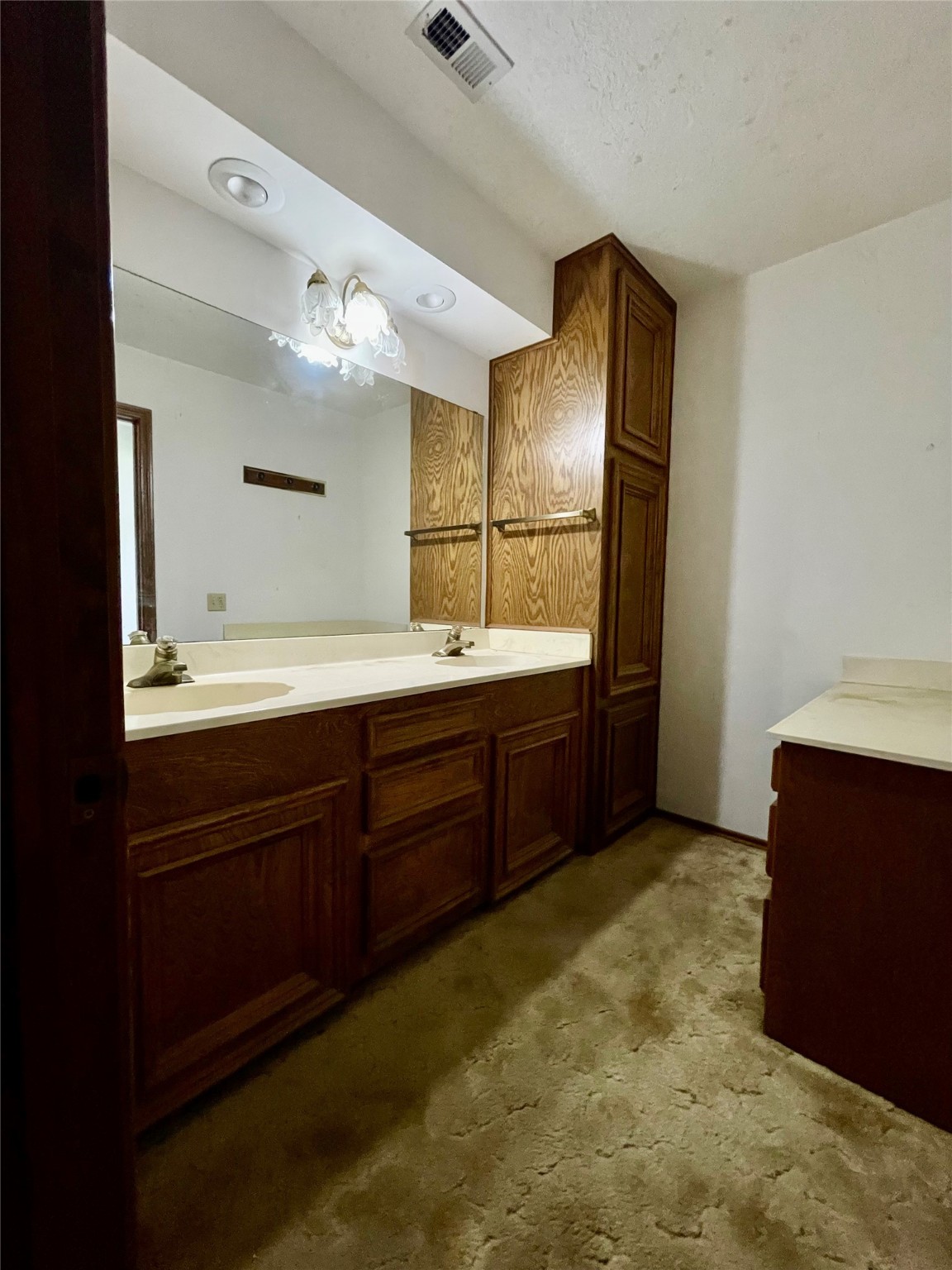 10074 Overbrook Drive Conroe, TX 77304 - Photo 15 of 22 a spacious bathroom with a sink and a mirror
