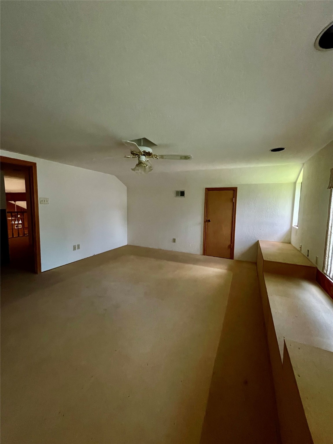 10074 Overbrook Drive Conroe, TX 77304 - Photo 20 of 22 a bedroom with a bed and a lamp