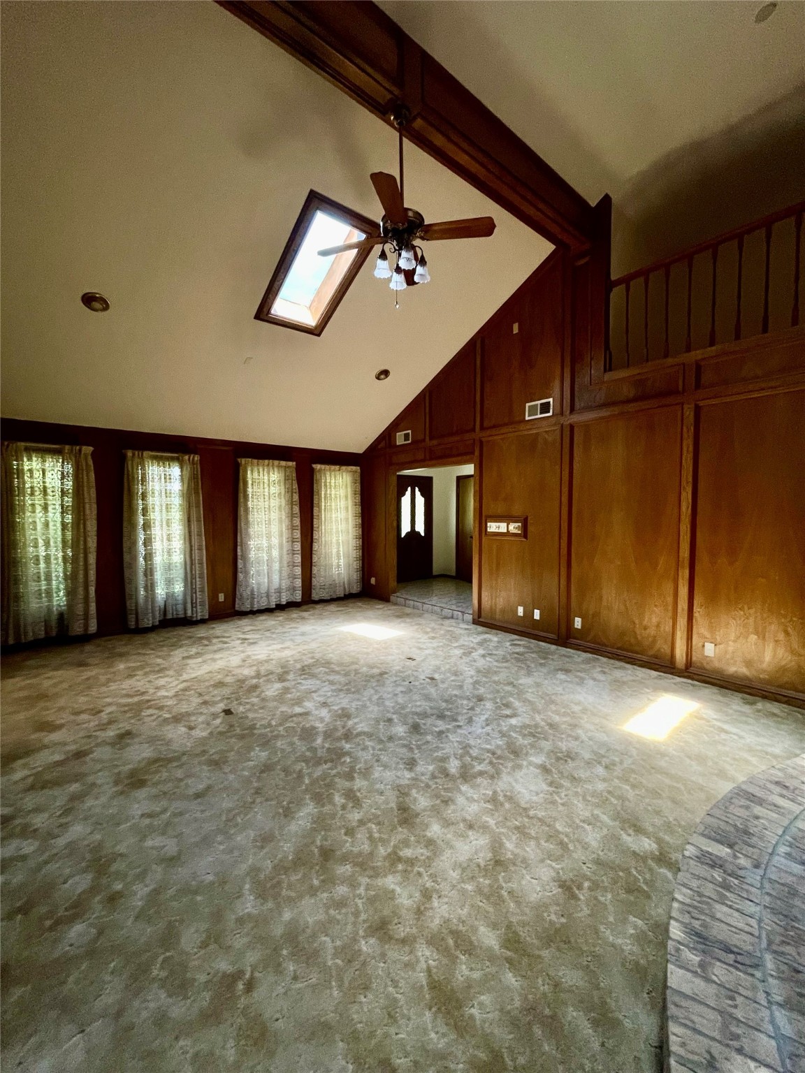 10074 Overbrook Drive Conroe, TX 77304 - Photo 3 of 22 an empty room with windows and fan