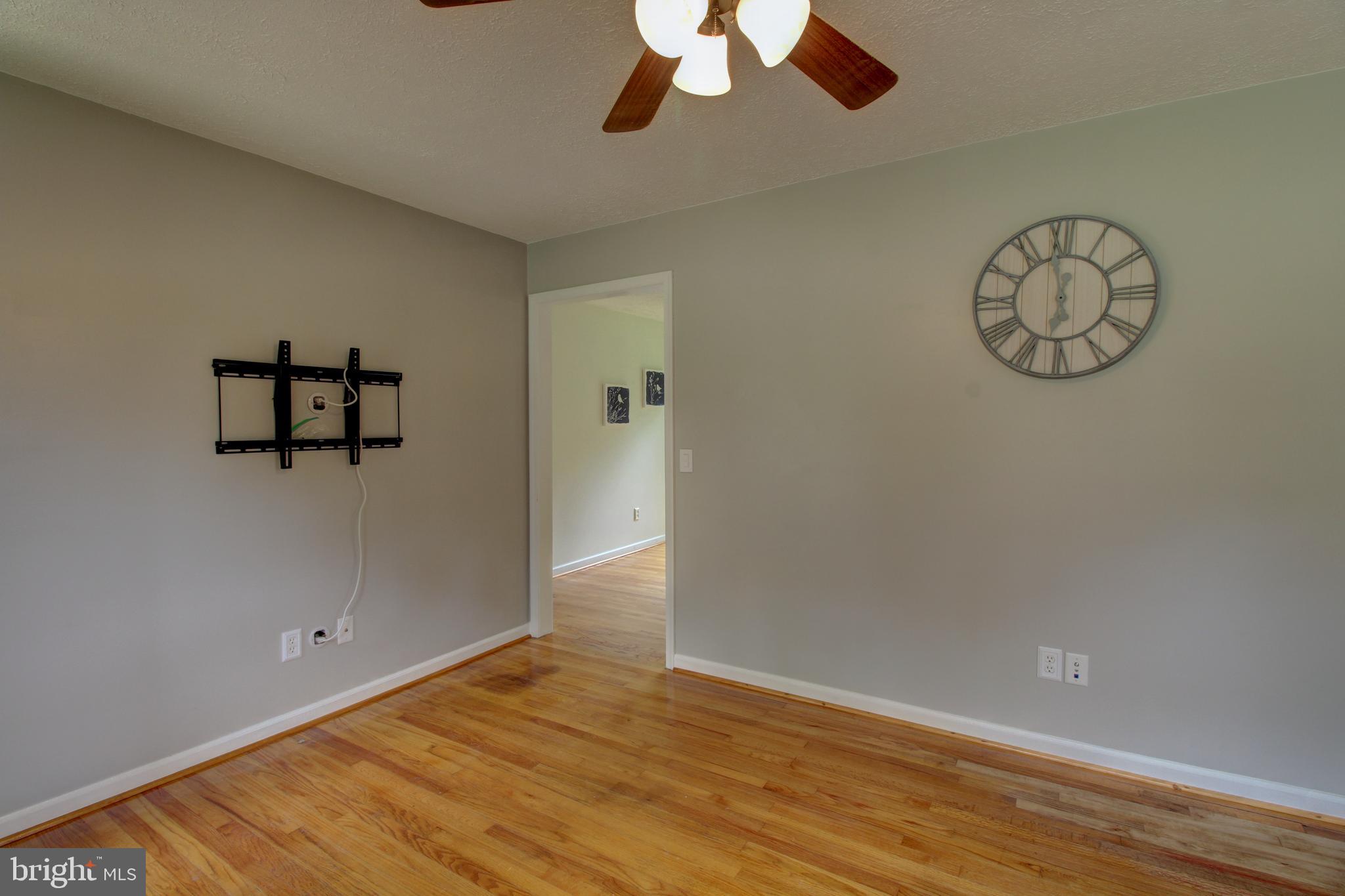 17153 North Merrimac Road Culpeper, VA 22701 - Photo 7 of 34 Living room with TV Mount in place