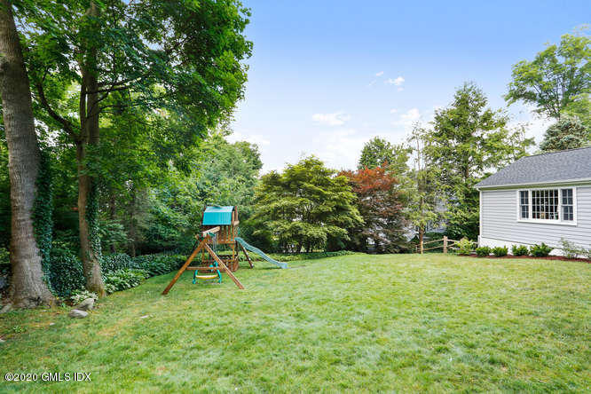 16 Pierce Road Riverside, CT 06878 - Photo 29 of 36 a view of a house with a backyard