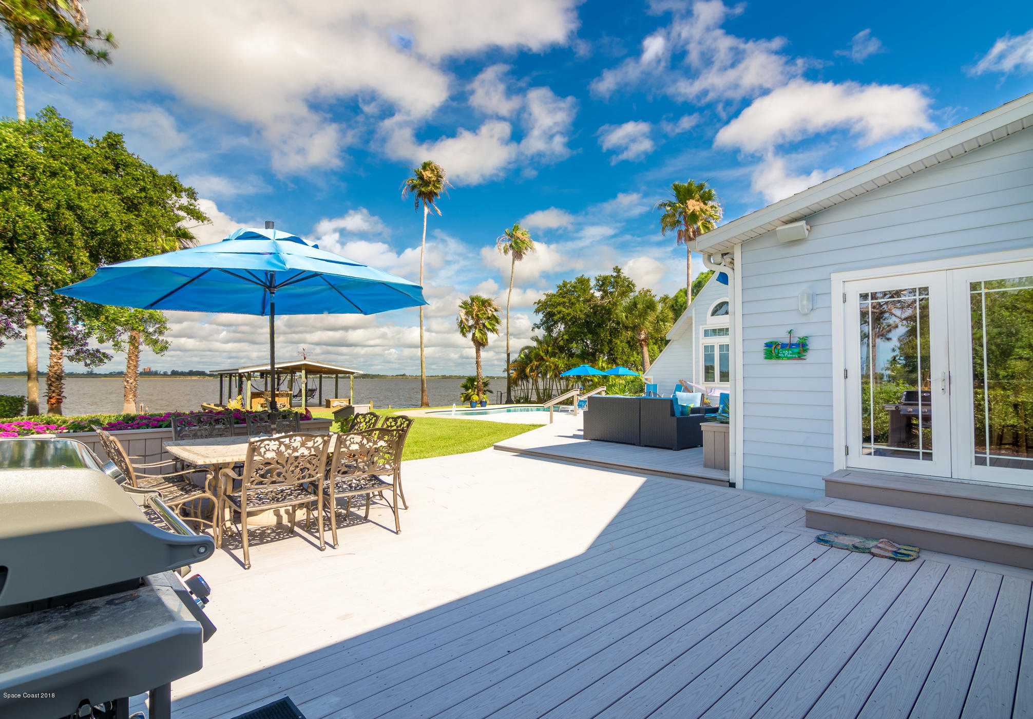 1125 Faulkingham Road Merritt Island, FL 32952 - Photo 23 of 35 Gorgeous Wrap-around Azek(r) Deck