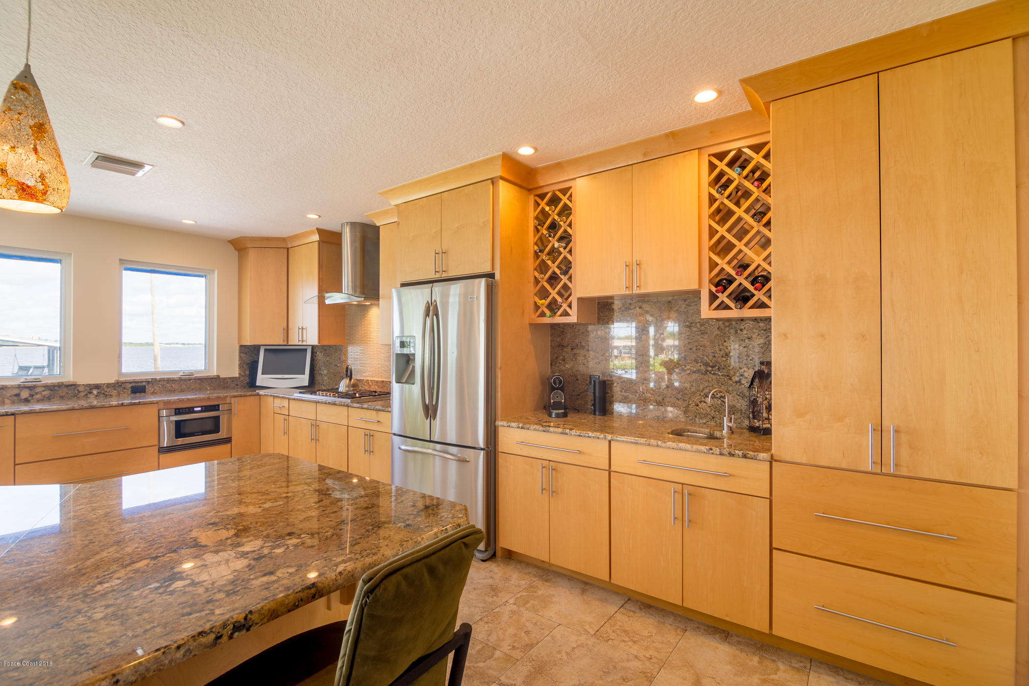 1125 Faulkingham Road Merritt Island, FL 32952 - Photo 5 of 35 Wet Bar with built-in Wine Racks