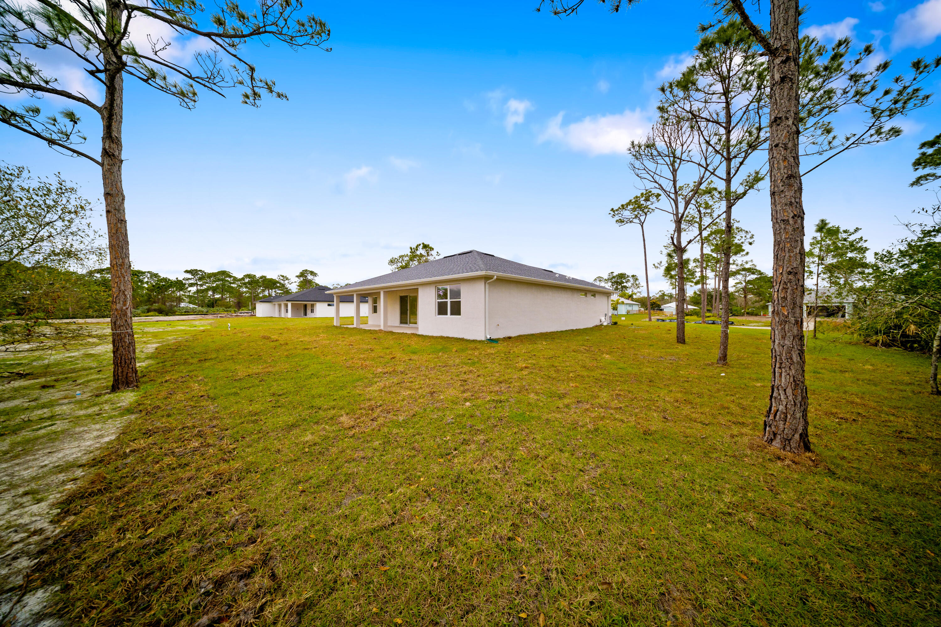 10619 Sugar Pine Drive Fort Pierce, FL 34945 - Photo 34 of 44 back elevation