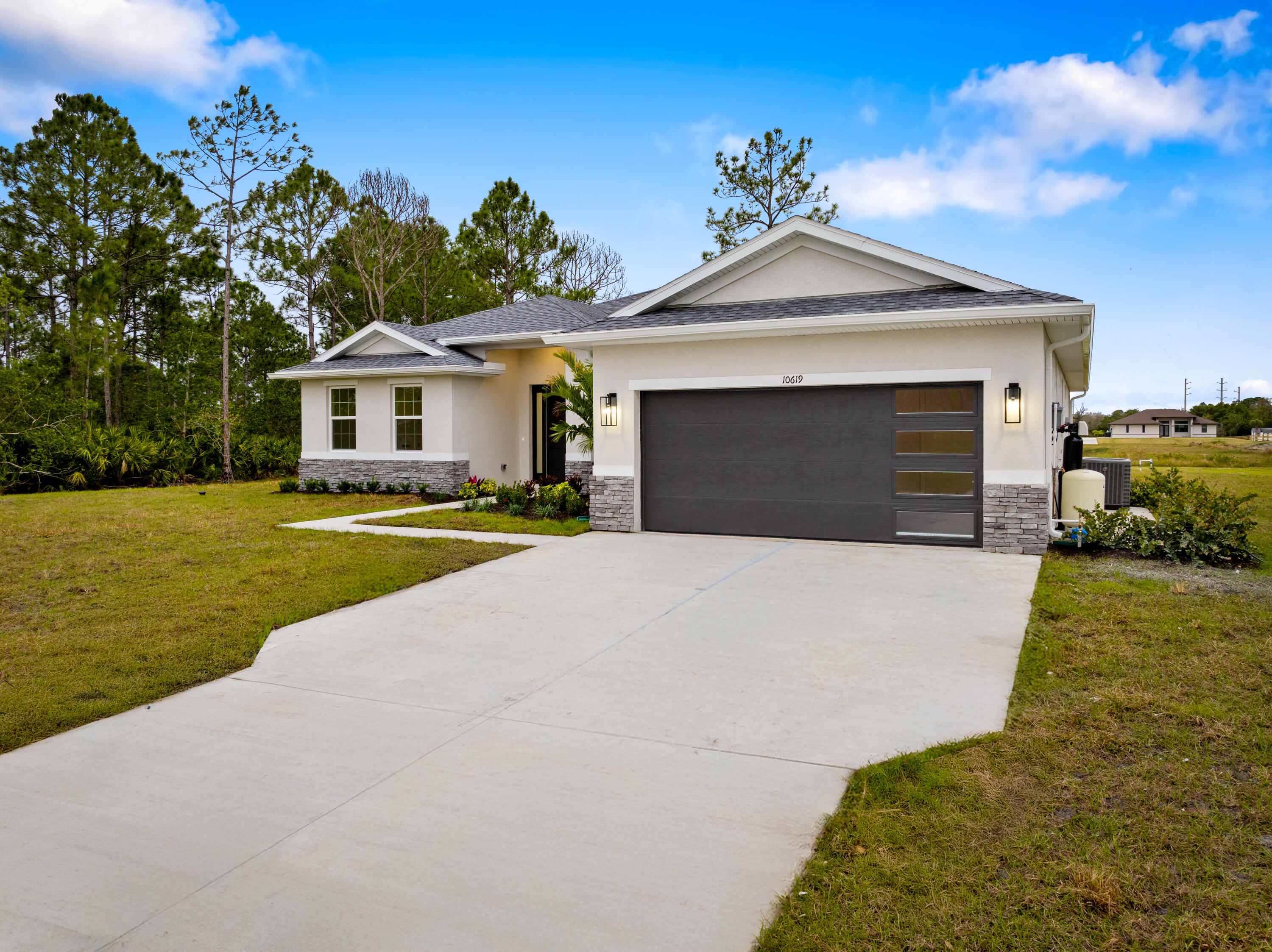 10619 Sugar Pine Drive Fort Pierce, FL 34945 - Photo 40 of 44 garage elevation
