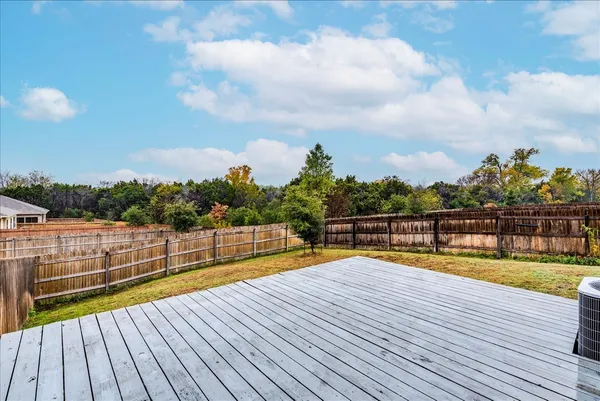 a view of a swimming pool with a lake view