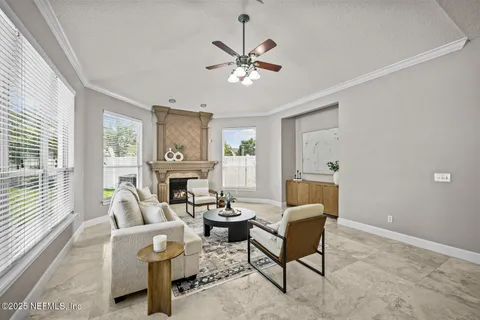 a bedroom with bed and a window