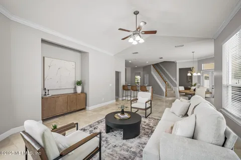 a view of entryway and kitchen