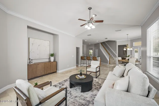 a view of entryway and kitchen